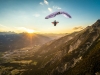 High up in the air, the Alps, a sunset and a full stall glider with Jean Baptiste Chandelier