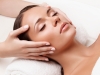 Face Massage.  Close-up of a Young Woman Getting Spa Treatment.